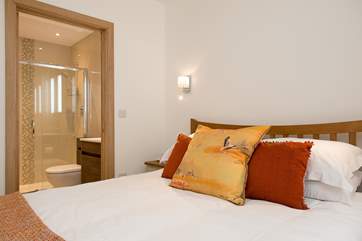 Bedroom 1 has a stylish en suite shower-room.