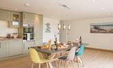 Although open plan, the kitchen and dining-area are separate from the sitting-area giving you the best of both worlds. - Thumbnail Image