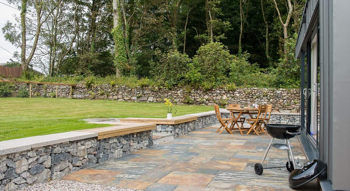 Why not light up the barbecue and enjoy the lovely private garden?