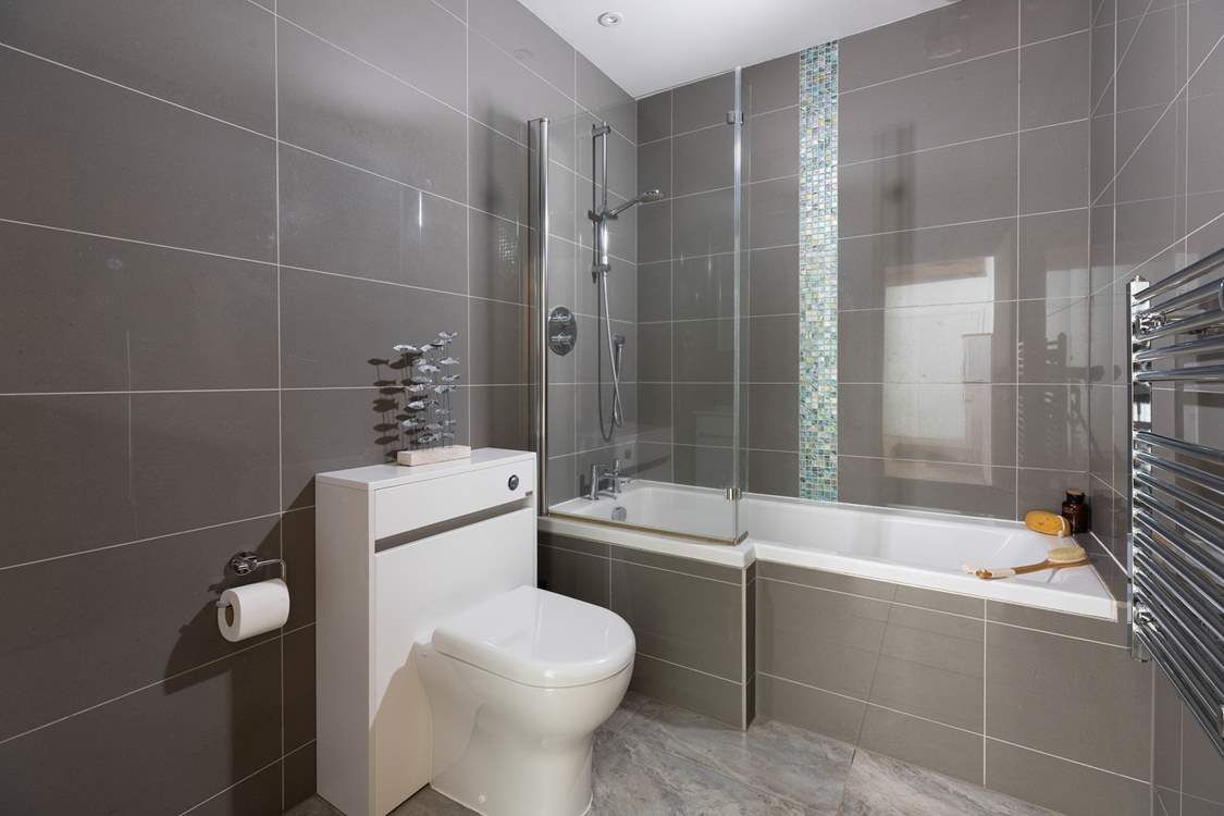 The family bathroom is modern and stylish.