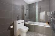 The family bathroom is modern and stylish.