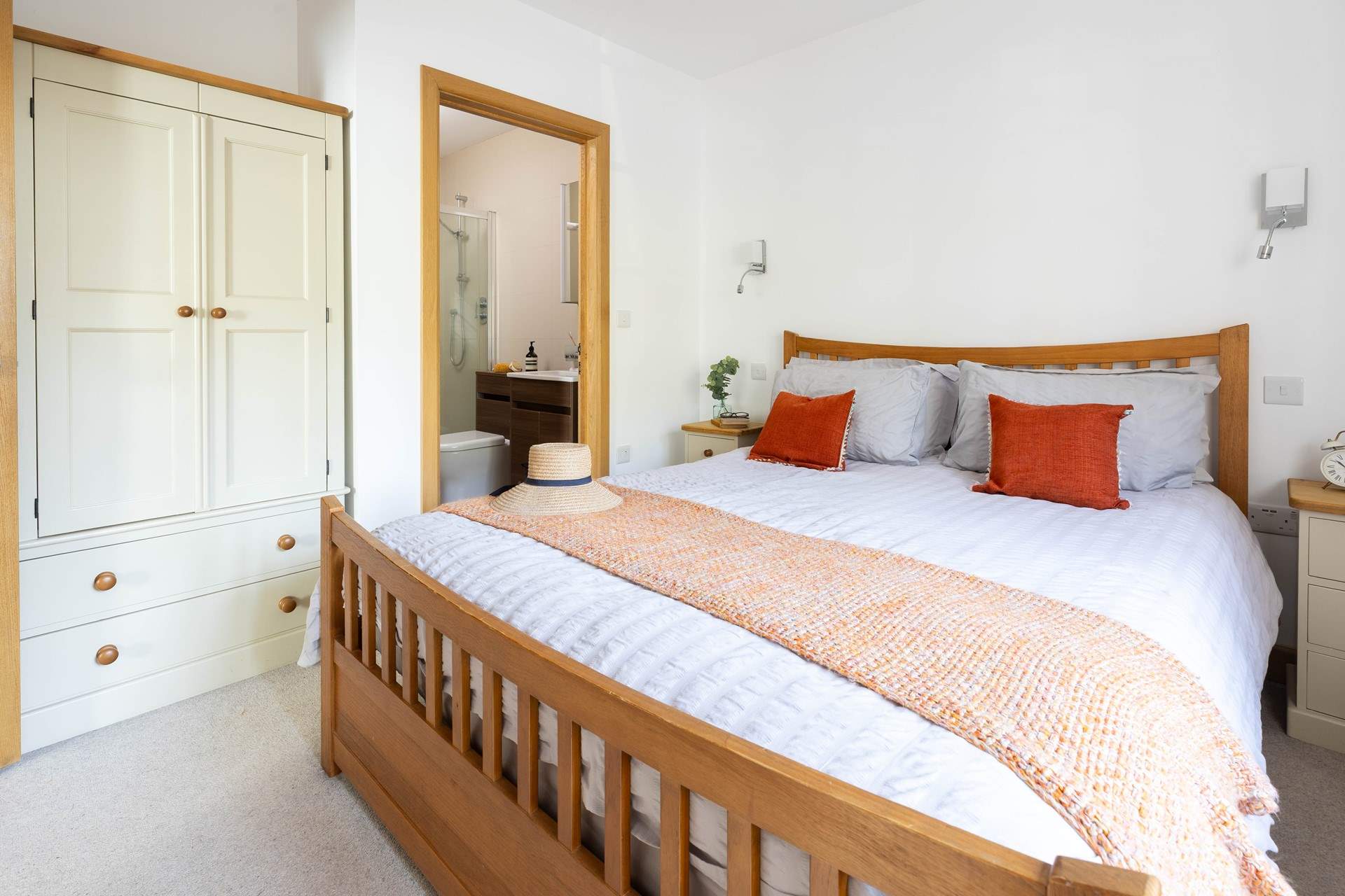The main bedroom has a luxurious king-size bed and en suite shower-room.
