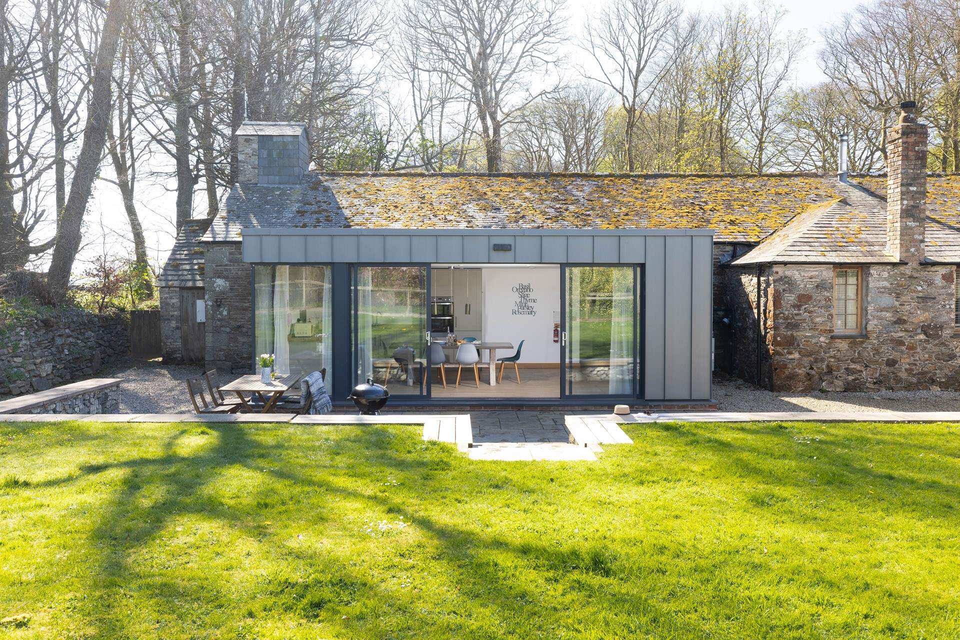 The Coach House has a sunny garden and patio. 