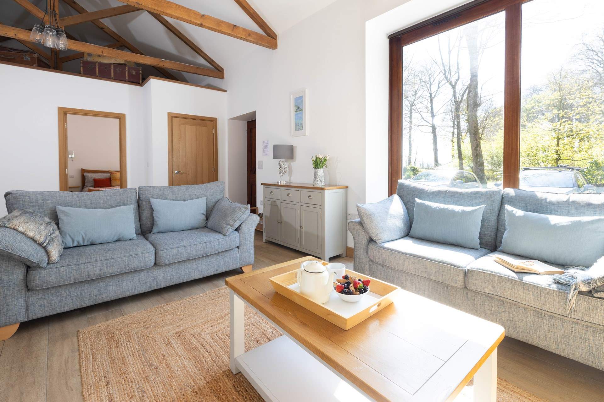 The spacious sitting-room has been thoughtfully converted. 