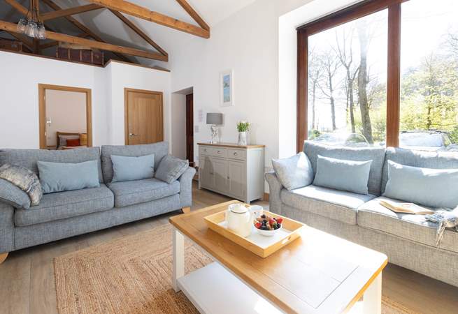 The spacious sitting-room has been thoughtfully converted. 