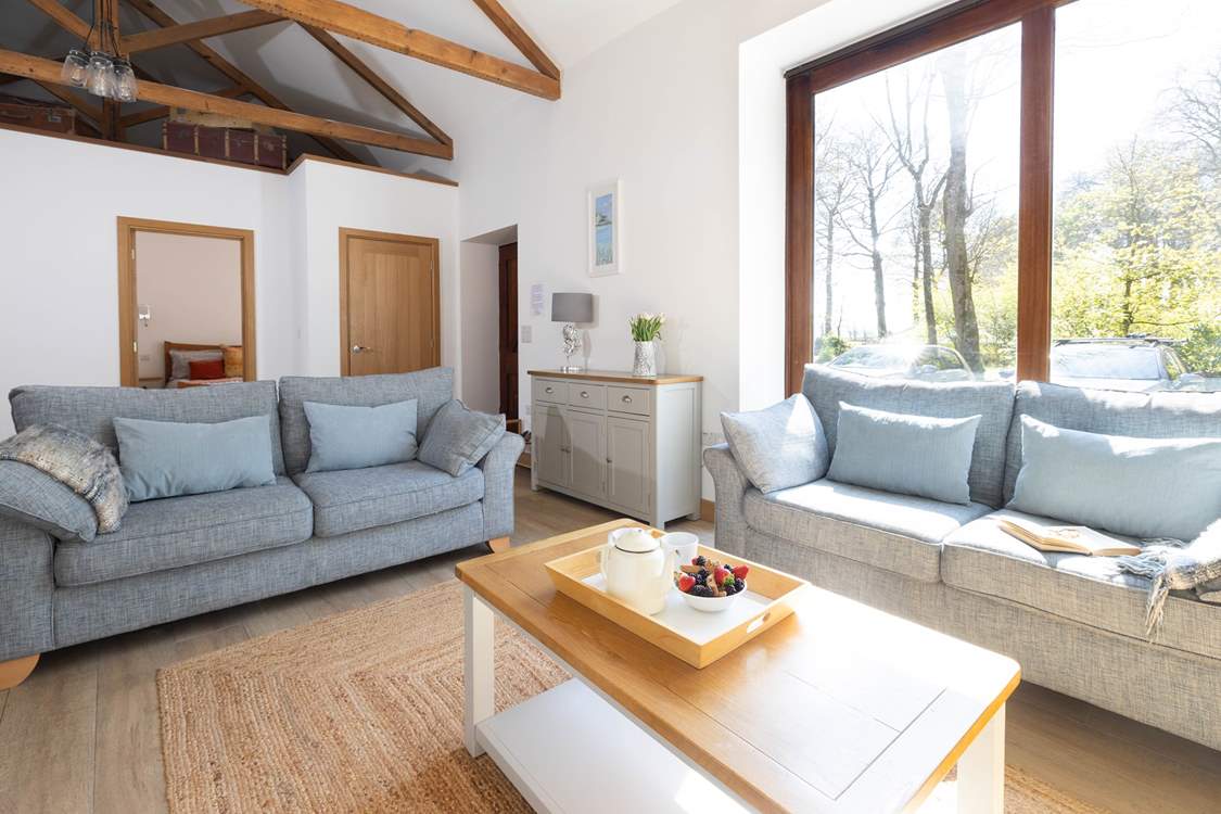 The spacious sitting-room has been thoughtfully converted.