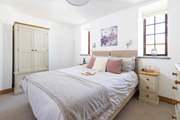 The second bedroom has 'zip and link' beds for flexibility.