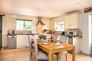 The kitchen and dining-area.