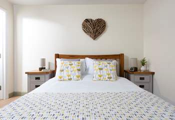 You'll soon drop off into the land of nod on this comfy king-size bed.