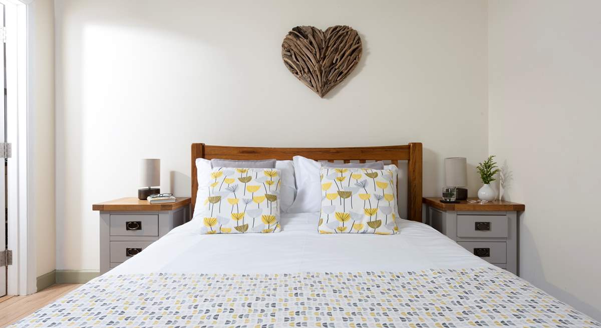 You'll soon drop off into the land of nod on this comfy king-size bed.