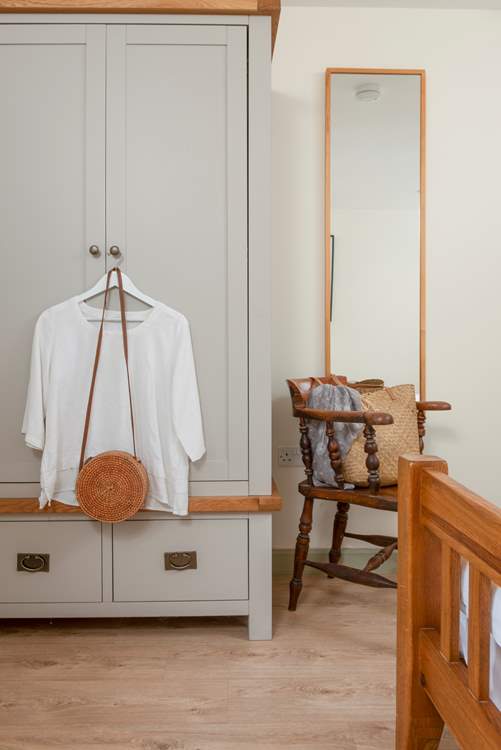 Bedroom 1 overlooks the shared courtyard.