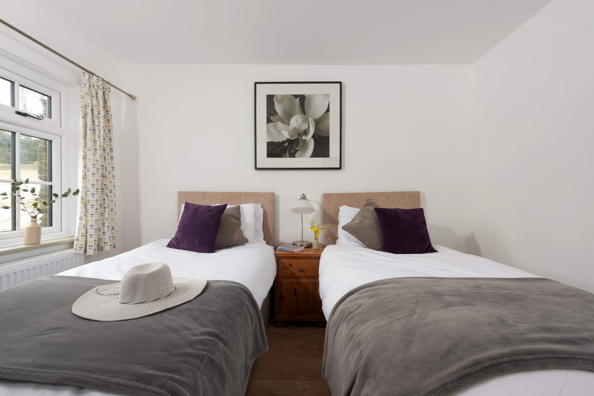 The pretty twin bedroom.