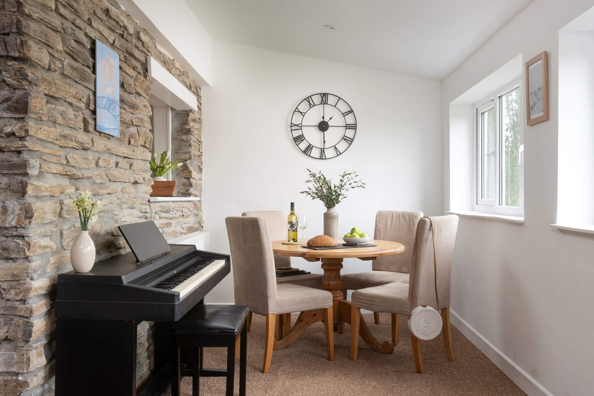 You may prefer to dine in the garden room, and you can provide your own musical entertainment on the piano.