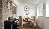 You may prefer to dine in the garden room, and you can provide your own musical entertainment on the piano. - Thumbnail Image