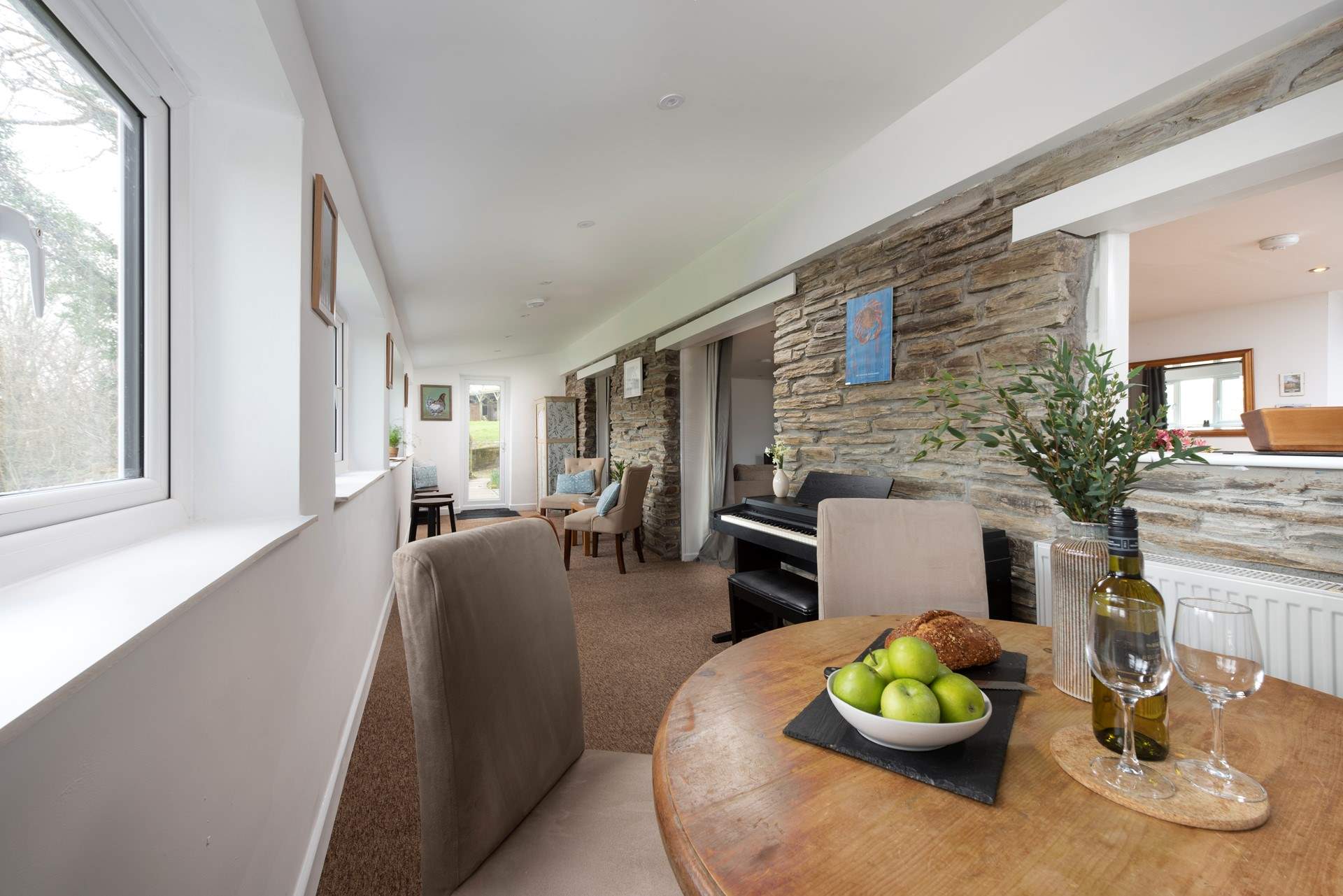 The Garden room runs the full length of the barn, with views out over your own private garden area.