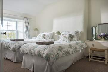 Bedroom 3 has twin beds.