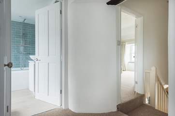 Looking into the family bathroom and Bedroom 1 from the landing.