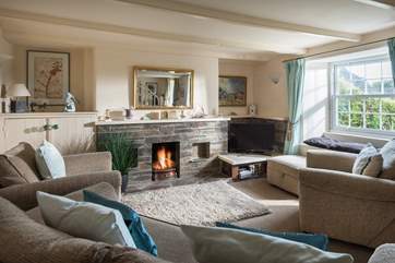 An open fire in the sitting/dining-room.