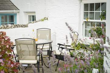 A lovely spot for morning coffee or an evening drink, overlooking the green.