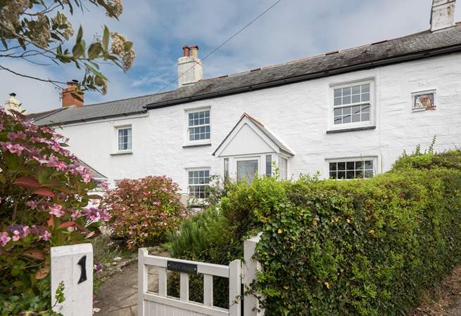 End Cottage is a delightful semi-detached cottage overlooking the village green.