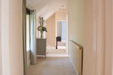 Looking down the hallway from the twin bedroom towards the stairs.