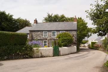 This pretty stone cottage is on the lane that takes you through the village, there is a 30mph restriction and the cottage has double-glazing.