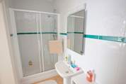 The en suite shower-room to the main bedroom.