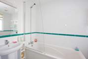 Modern family bathroom to enjoy a soak after your days' adventures.