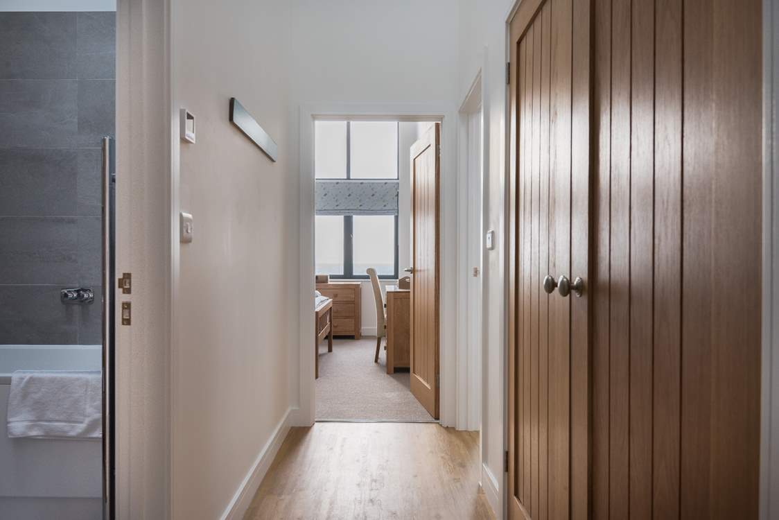 The main bedroom is all the way down the hallway so both rooms can enjoy their privacy.