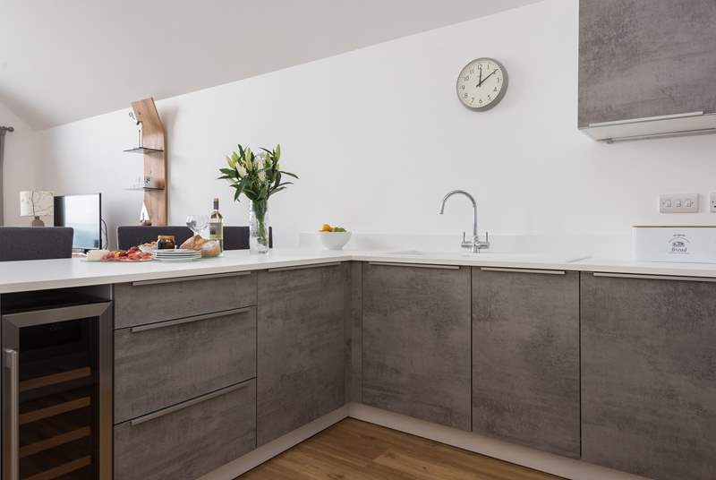 A fabulous kitchen with everything you need including a wine fridge!