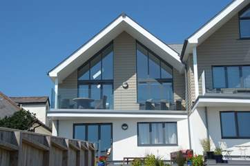 The Dream overlooks the beach at Praa Sands (although it is on the first floor of this photograph, it is accessed at the back which is at ground level due to being built into an embankment).