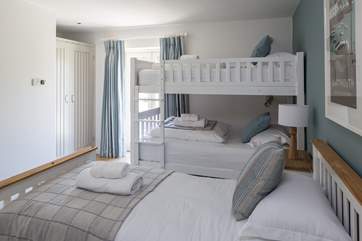 Bedroom 2 has a door which leads out straight onto the patio. Easy to keep an eye on the children as they sleep whilst you enjoy a glass of something tasty on the decking.