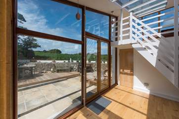 Floor to ceiling windows let the light flood in.