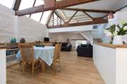 The living area, and above the sitting-area is the mezzanine bedroom housing a single bed (please take care with small children).