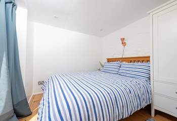 A king-size bed for a relaxing sleep. 