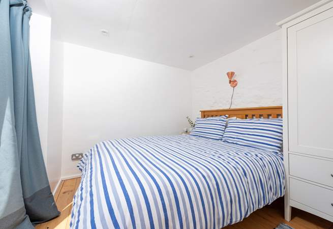 A king-size bed for a relaxing sleep. 