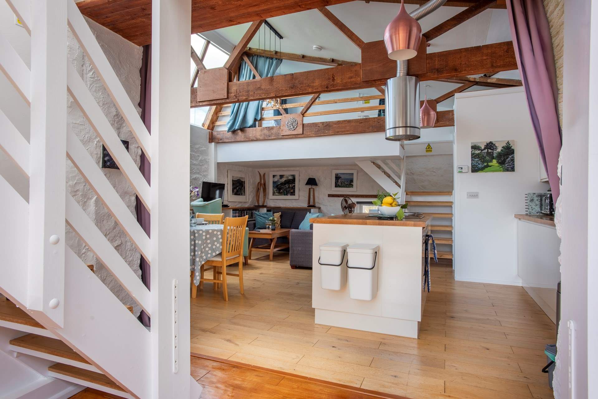 The living area and above is the mezzanine bedroom housing a single bed (please take care with small children).