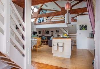 The living area and above is the mezzanine bedroom housing a single bed (please take care with small children).
