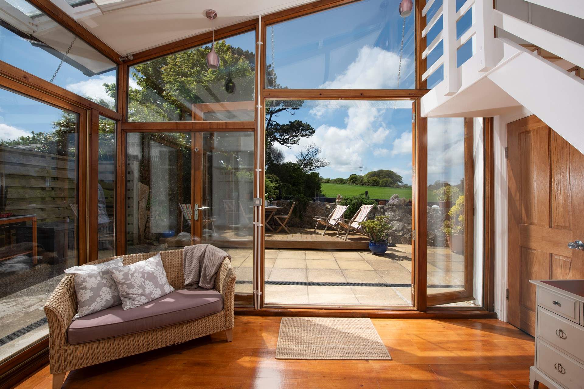 Floor to ceiling windows let the light flood in.