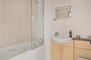 The family bathroom is ready to wash away the day's sand and sun cream.