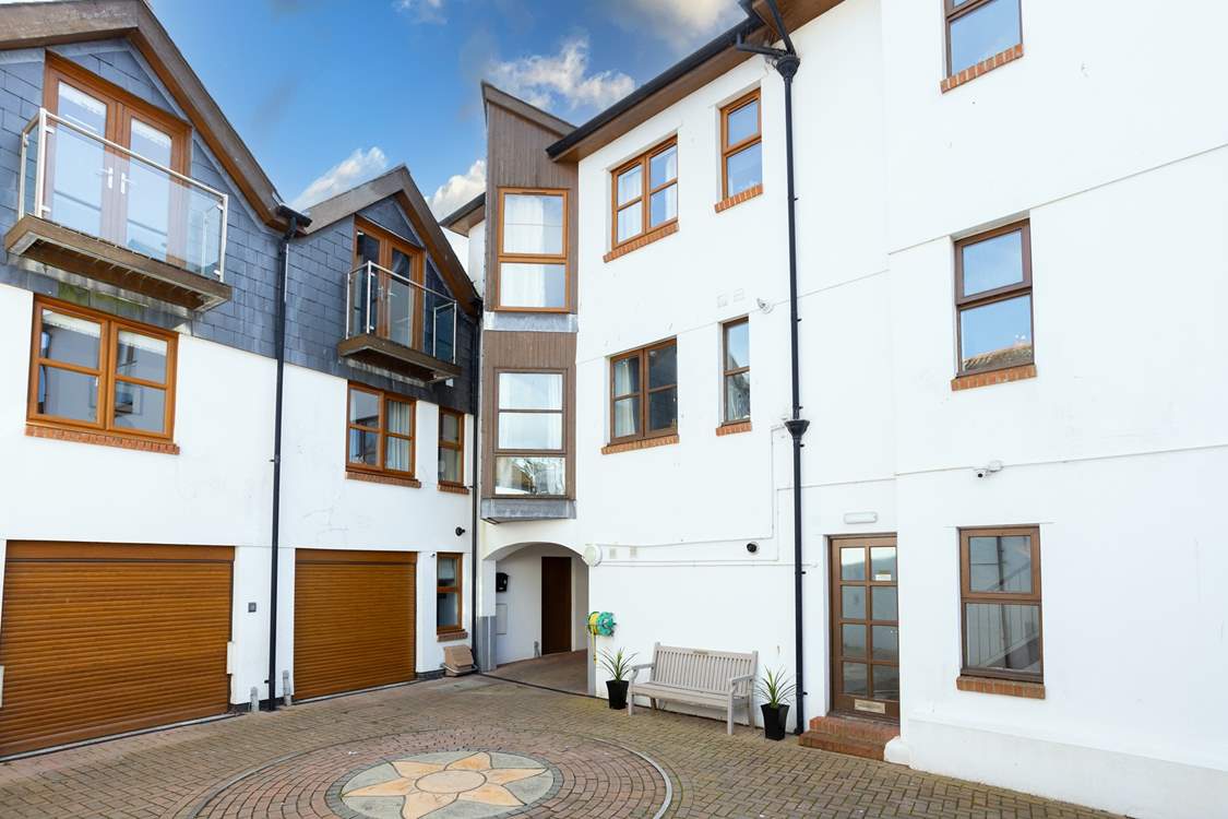 Welcome to Pump Street apartments. 1 Pump Street Mews is situated above the bench.