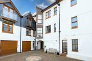 Welcome to Pump Street apartments. 1 Pump Street Mews is situated above the bench.