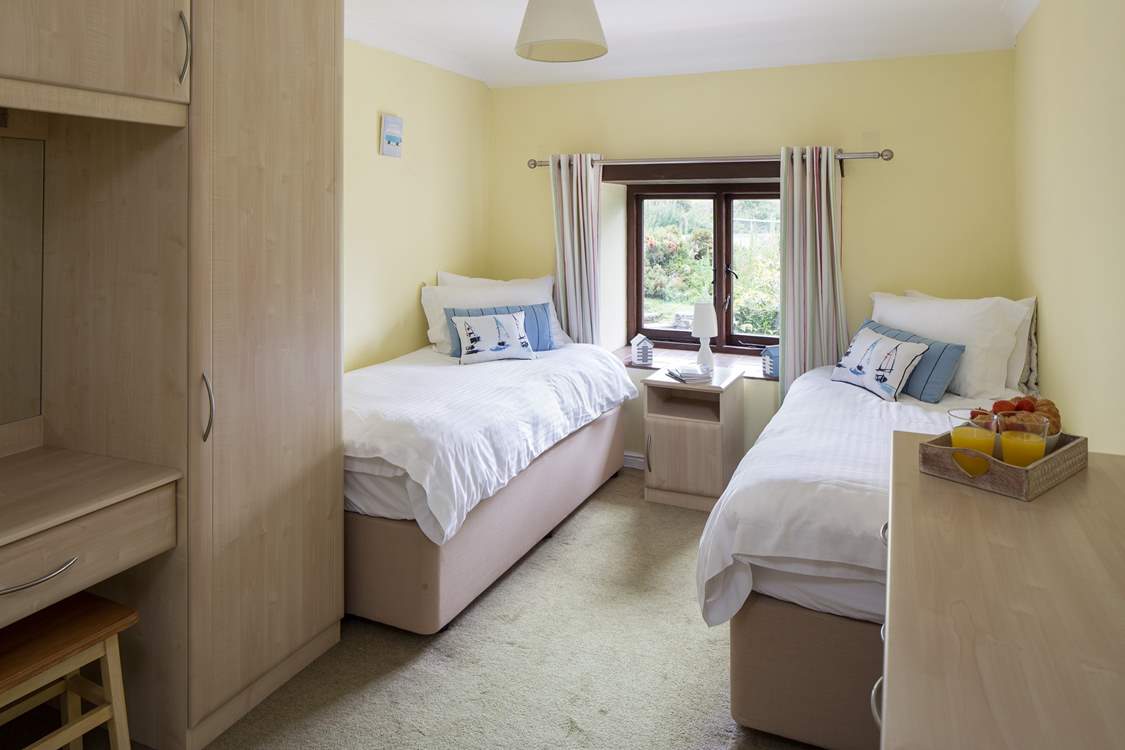 Bedroom 2 made up as a twin room.