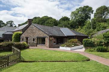 The swimming pool can be found in this lovely building.