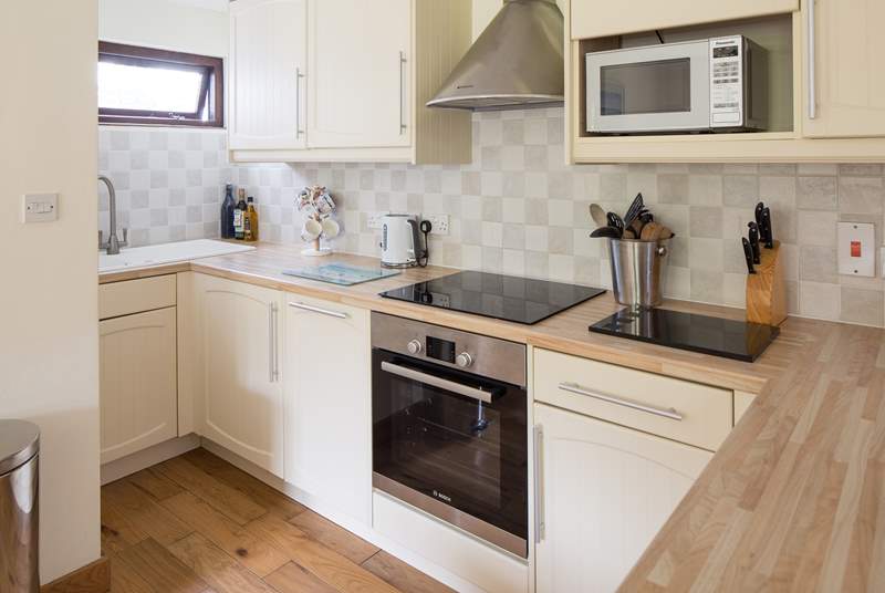 Compact, yet fully equipped kitchen, offering everything you will need.