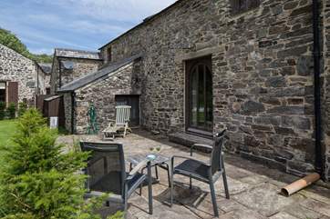 Step out of the sitting-room onto your own private patio area. A real little sun-trap.