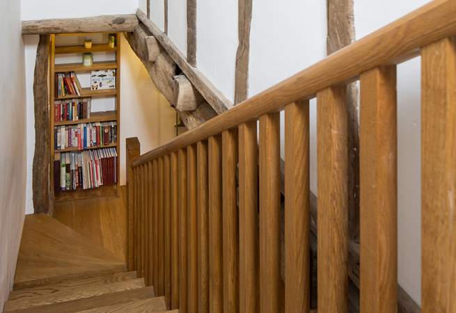 A beautiful staircase takes you to the first floor bedrooms.