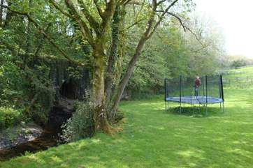 The communal trampoline. Please take care when using this facility.