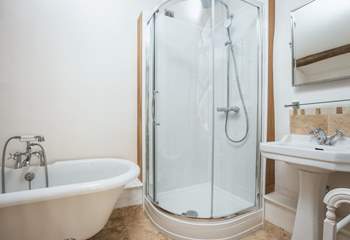 The en suite also has a fitted shower cubicle. 