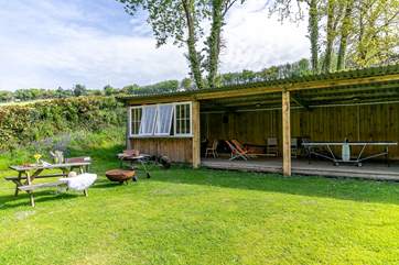 The fabulous outhouse games room is shared with two other cottages.